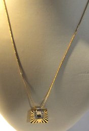 GOLD TONE NECKLACE WITH STONES