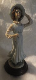YOUNG GIRL FIGURINE