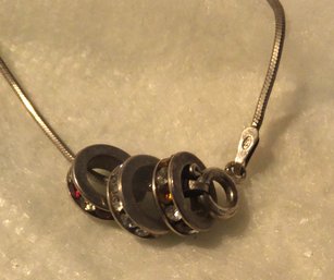 18' STERLING NECKLACE WITH 3 RING CHARMS