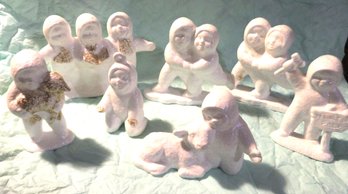 7 SNOW BABY FIGURINES