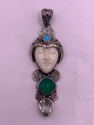 Sterling Silver Carved Bone Face Gemstone Pendant