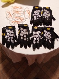 Six Pairs Of Safety Glasses And Six Pairs Of Mechanic Gloves