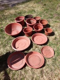 Lot Of 6 Saucers And 9 Planters