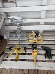 4 Water Sprinklers And 1 Nozzle