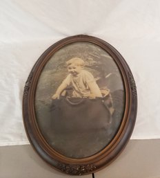 Antique Oval Frame With Curved Glass