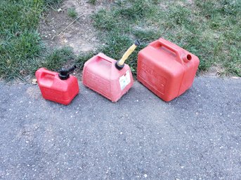Assortment Of Gas Cans 5 Gallon, 2.5 Gallon, & 1 Gallon