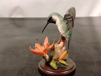 Brand New Ceramic Hummingbird With Lily