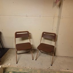Two Plastic & Metal Folding Chairs