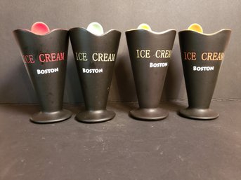 Four Ice Cream Dishes With Spoons