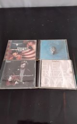 CDS With 1994 Eagles Ticket Stub