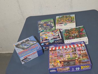 Assorted Puzzles & New Stow & Go Mat