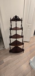 Antique Dark Wood Corner Shelf With Ornate Carved Top And Turned Spindle Supports.