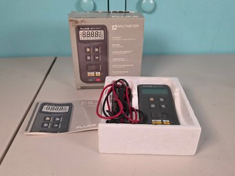 Vintage 1991 Fluke 12 Digital Compact Multimeter With Box, Test Leads & Manual