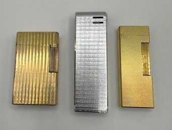 Three Lighters Including Dunhill
