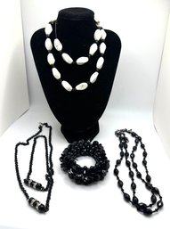 Three Beaded Necklaces And A Stretch Bracelet