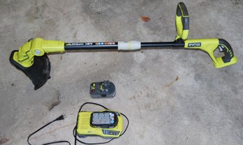 Ryobi Trimmer With Charger And Two Batteries