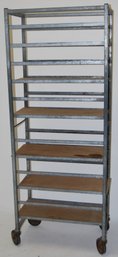 Vintage Industrial/ Bakers Rack On Wheels