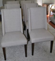 Set Of Six Upholstered Wing Back Dining Chairs With Nailhead Trim. Some Marks On Uphol