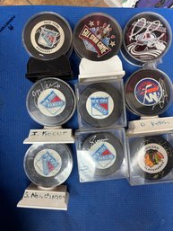 Lot Of Signed Hockey Pucks
