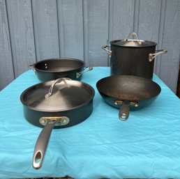 Four Calphalon Pans With Two Lids
