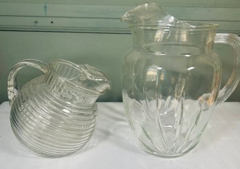 Two Glass Pitchers