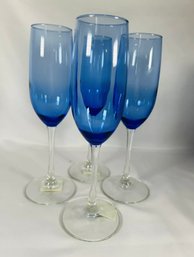 4 Blue Glass Champagne Flutes, Never Used