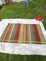 Colorful Striped Wool Area Rug With Warm Earth Tones.