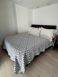 Modern Upholstered Queen Bed With Bedding.