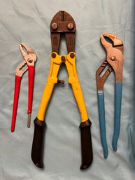 2 Tool Pliers And A Bolt Cutter