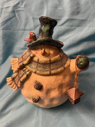 Smiling Glittered Snowman Holding A Lantern & Bird On His Hat