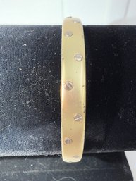 Gold Tone Bangle With Silver Accents