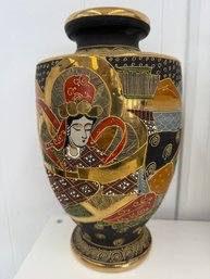 Japanese Satsuma Ware Vase From The Early 20th Century Featuring Elaborate Polychrome And Gold Decoations