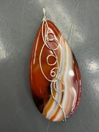 Handcrafted Orange And White Banded Agate Pendant Featuring A Sterling Silver Wire- Wrapped Design