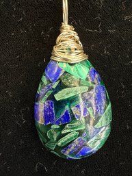 Handcrafted Teardrop Shaped Pendant Featuring A Mosaic Of Green And Blue Gemstone Fragments