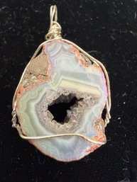 Wire Wrapped Agate Geode Slice Pendant Often Featuring A Polished Slice Of Agate Quartz Crystal Center