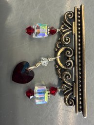 Vintage Brook Featuring Metal Filigree Frame Adorned With Red Crystals And A Heart Shaped Charm