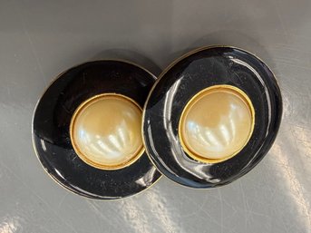 Vintage Clip-on Earrings With Black And Gold Enamel Design