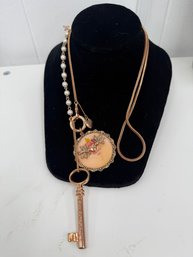 Vintage Lariat Style Betsey Johnson Necklace Features A Handpainted Floral Cameo, Key Charm And Beaded Chain