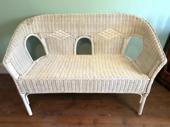 White Wicker Settee Kept Indoors