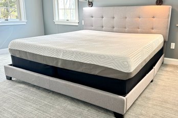 A King Size Bed With Upholstered Tufted Linen Headboard