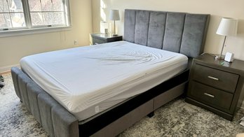 A Queen Size Microfiber Bed With Mattress And Box Spring