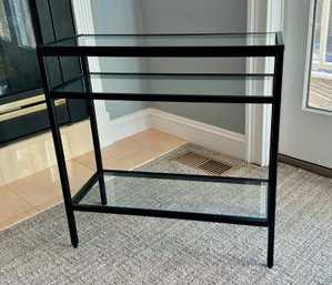 A Glass Top With Metal Frame Black Three Tier Side Table