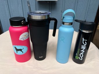 Four Hydro Flask Water Sports Bottles