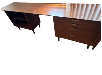 Vintage Mid Century Modern Walnut Executive Desk Features A Classic Three-drawer Pedestal And Angled Tapered