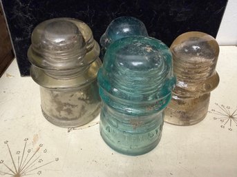 Lot Of 4 Vintage Glass Insulators Embossed With AM Tel And Tel Co-clear And Aqua Green Color
