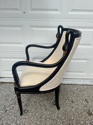 Elegant Vintage Armchair With Black Wood Frame And Cream Striped Upholstery.