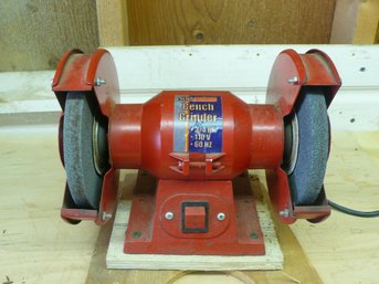 Red Bench Grinder Featuring A 3/4 HP Motor, 110 V, And 60 Hz