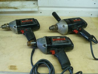 Three Vintage Sears Craftsman 3/8-Inch Corded VSR Power Drills With Black Housings And Metal Gear Cases