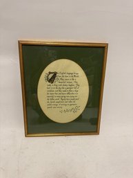 Framed Piece Of Calligraphy Art Featuring A Quote About The Irish Relationship With The English Language.