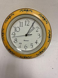 Vintage 1970s Westclox Floral Wall Clock With A Yellow Bezel.